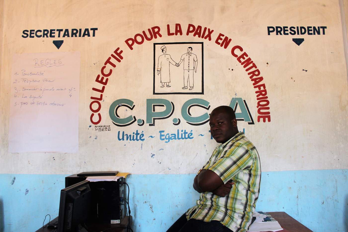 Dave Amadou-Maalamouda, chairman of the Collectif Pour la Paix en Centrafrique (CPCA) in his office in District Three in Bangui. Photo: Tijs Magagi Hoornaert\/UN Migration Agency (IOM) 2017